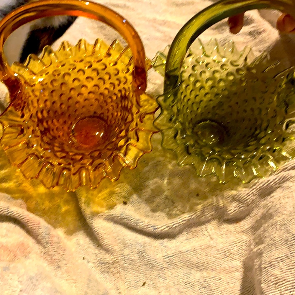 Antique glass baskets.